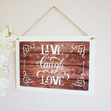 A white coated wooden rectangular hanging sign from the PhotoSplash HomeSplash collection, suspended by rustic twine and showcasing a photo, logo, or monogram with outstanding color reproduction.