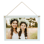 A white coated wooden rectangular hanging sign from the PhotoSplash HomeSplash collection, suspended by rustic twine and showcasing a photo, logo, or monogram with outstanding color reproduction, without a background.