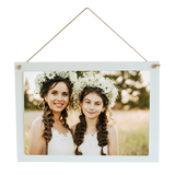 A white coated wooden rectangular hanging sign from the PhotoSplash HomeSplash collection, suspended by rustic twine and showcasing a photo, logo, or monogram with outstanding color reproduction, without a background.